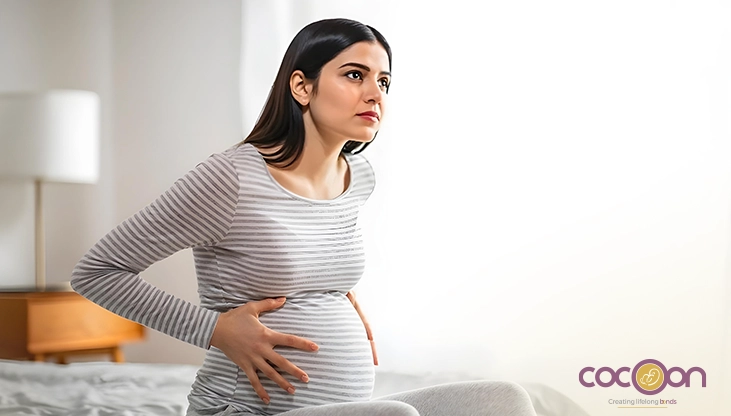 Why Does Your Stomach Feel Tight In Pregnancy? Causes & When To Be Careful